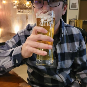 Mike Drinking their own Sawdust City brew!